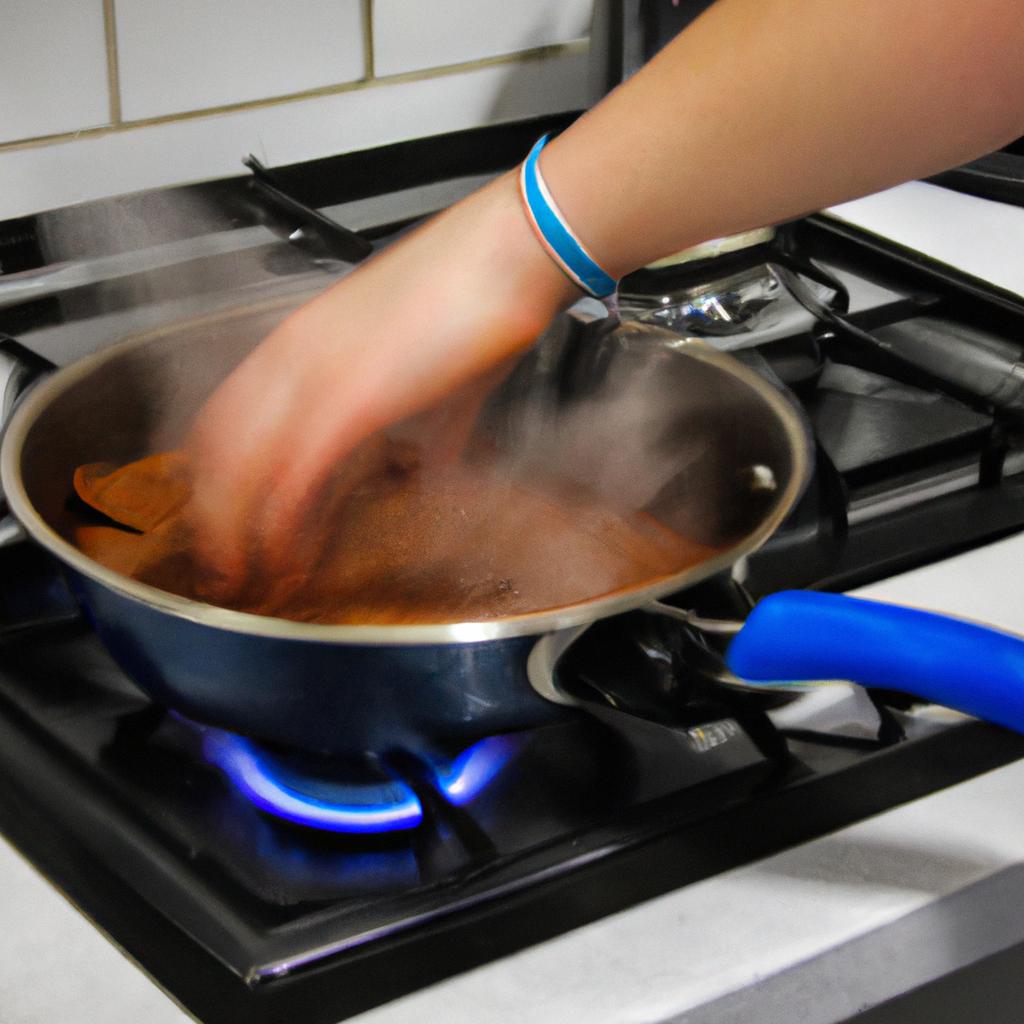 Person cooking in a kitchen